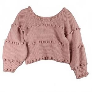 Storia Pink knitted sweater with pom-poms and bubble sleeves